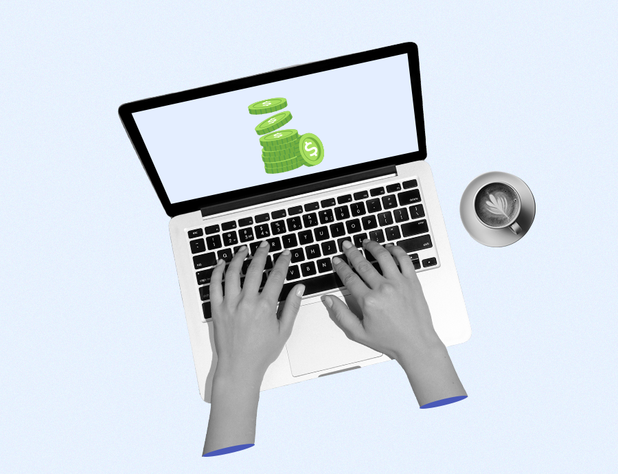 Freelancer at a desk with a computer and large mug looking for payment solutions for international freelancers