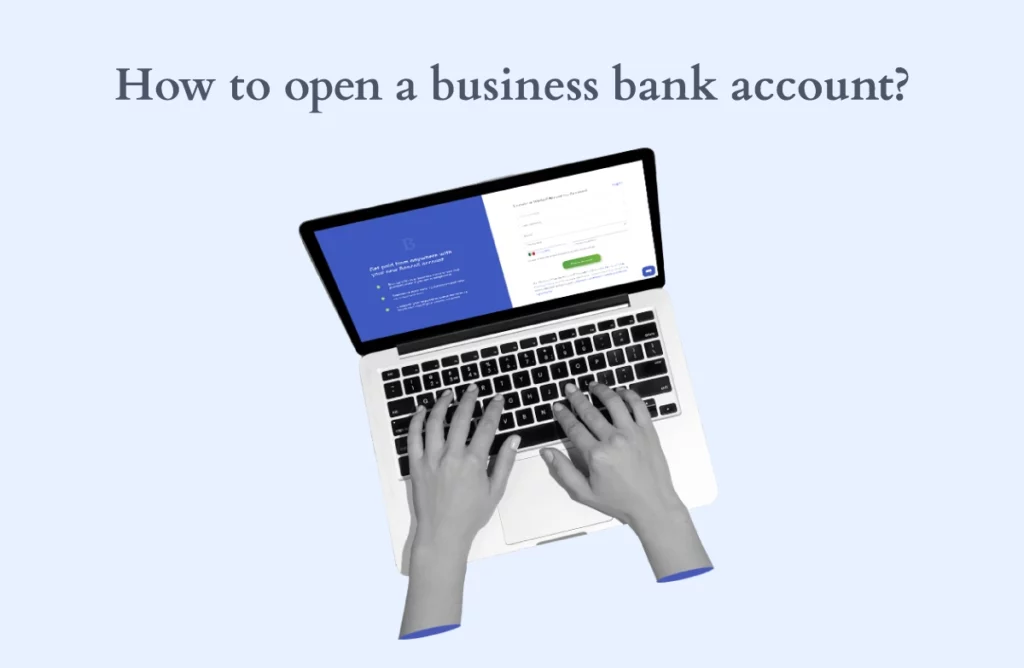 How to open a business bank account? question with a laptop screen displaying your business account dashboard while two hands typing.