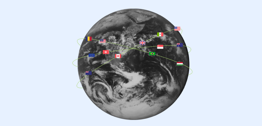 A graphic of the Earth with various national flags connected by green lines, symbolizing a global network of checking business accounts across continents, against a soft gray background.