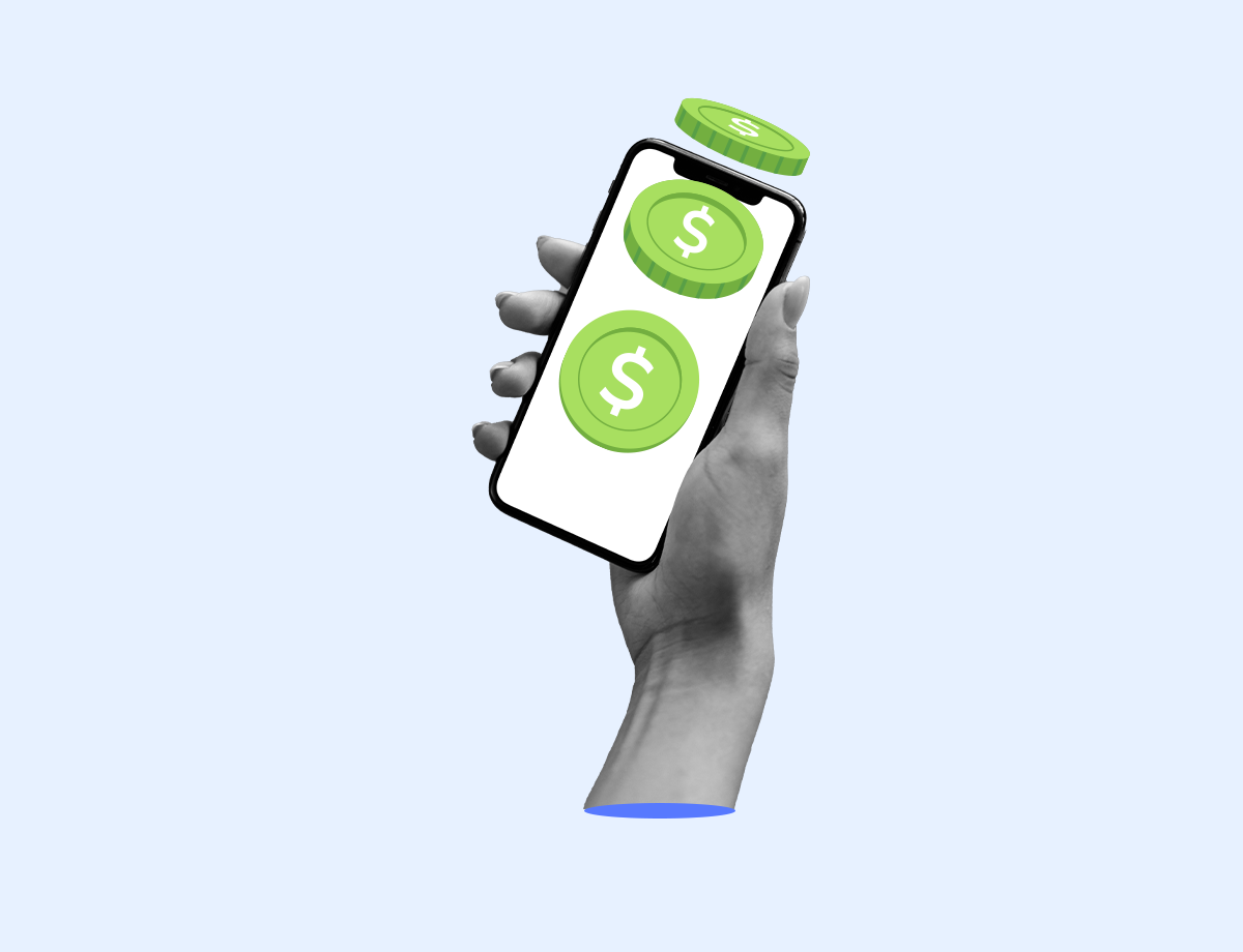 A smartphone with some green coins on its screen that alludes to an electronic payment.