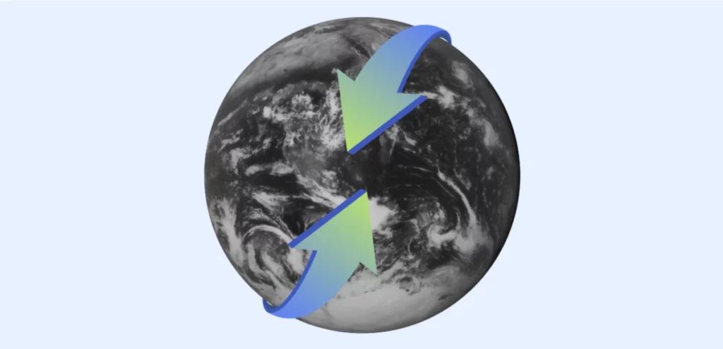 An image featuring a grayscale depiction of the Earth from space, overlayed with two stylized arrows in shades of blue and green that form a circular, clockwise motion around the globe.