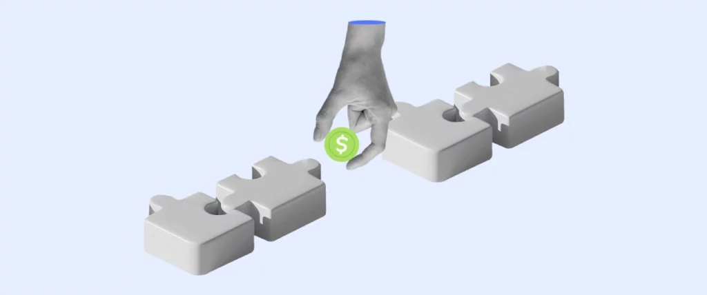 A 3D graphic showing a hand with a blue shirt cuff, positioned as if it's about to place a green dollar coin into a slot on a puzzle piece. There are other puzzle pieces interconnected, forming a path on a light grey background.