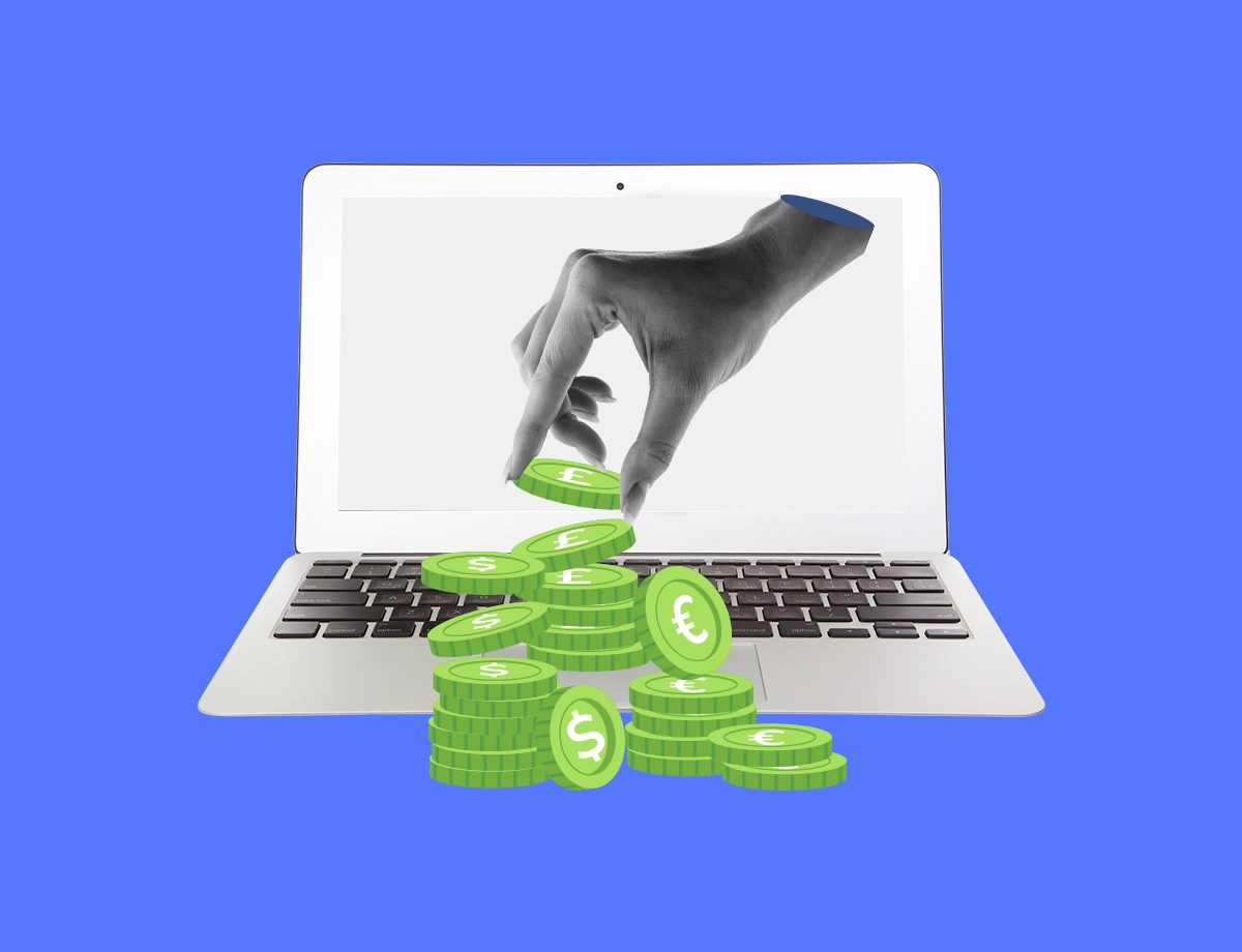 A laptop with a hand coming out of the screen, placing coins on a stack, symbolizing online financial transactions. The laptop is set against a blue background, emphasizing the digital aspect of the image.